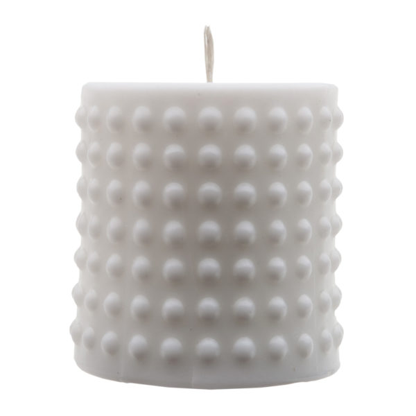 Белая интерьерная свеча из парафина - свеча столбик с рельефной поверхностью.